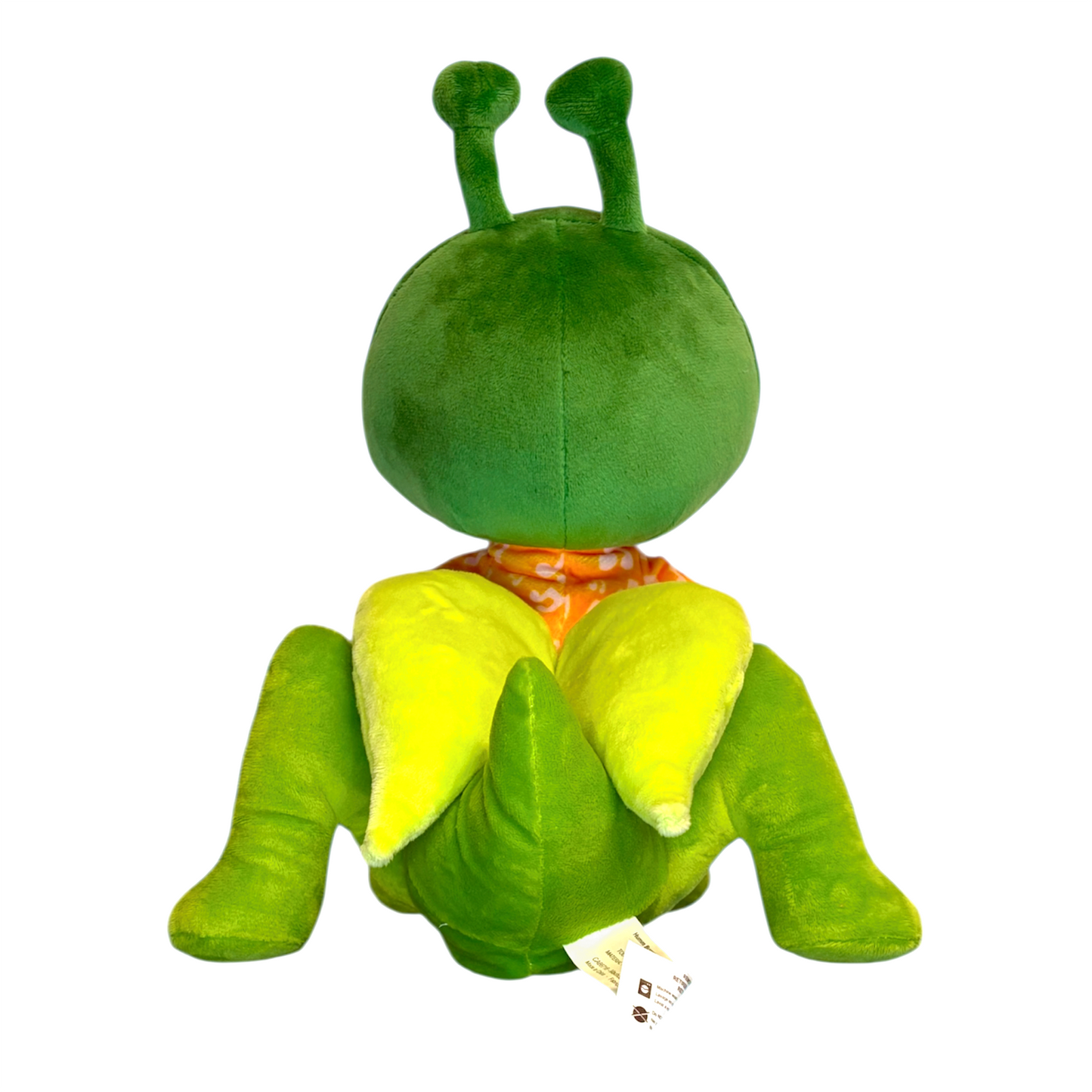 Green plush toy with a round body and long legs on a white background