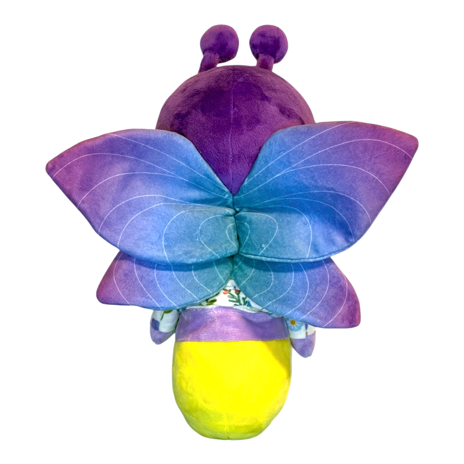 Plush toy butterfly with purple body and blue wings on a white background