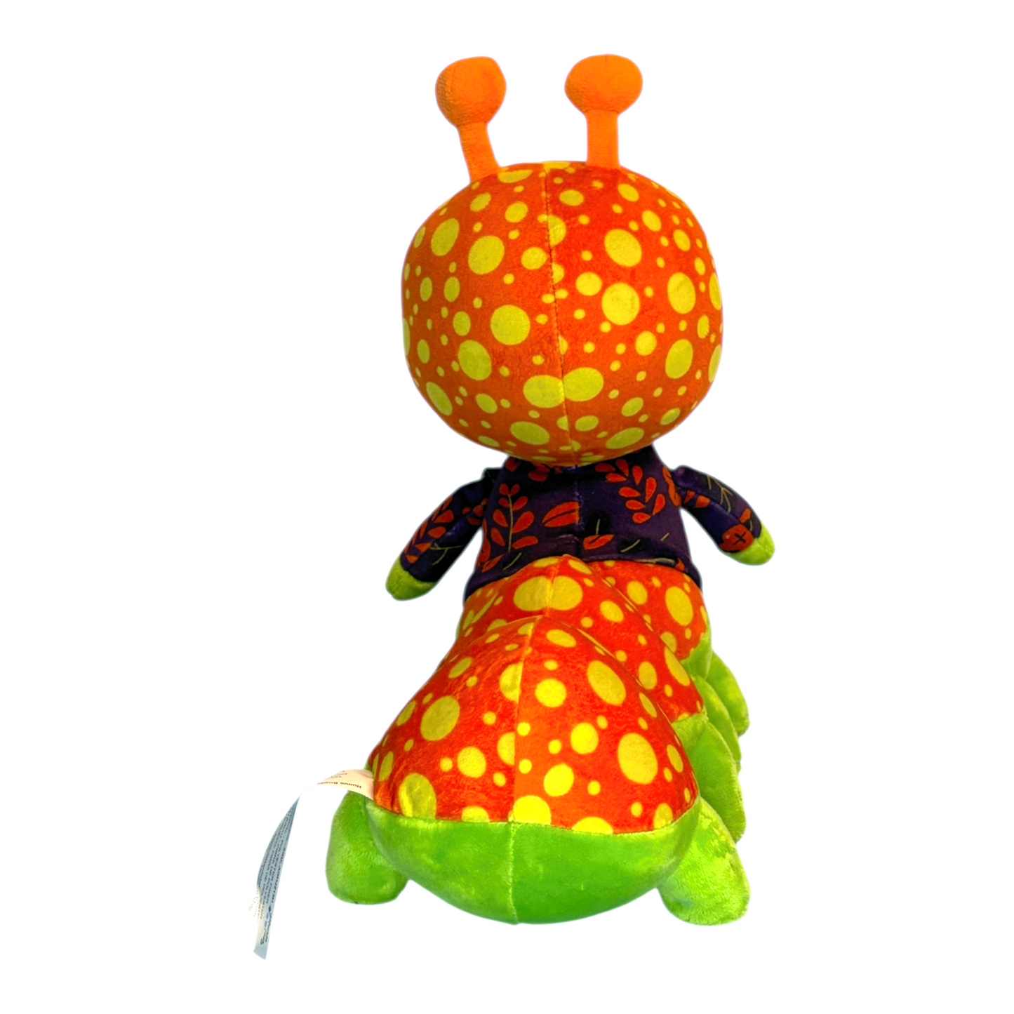 Colorful plush toy with polka dot pattern on a white background