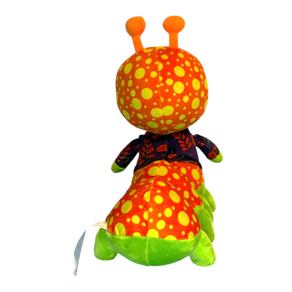 Colorful plush toy with polka dot pattern on a white background
