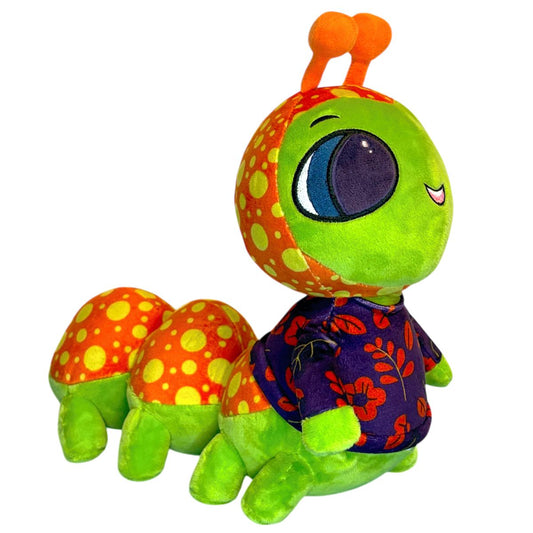 A colorful plush caterpillar toy with a bright green body, orange antennae, and patterned orange and yellow sections, wearing a purple shirt with red floral print, isolated on a white background.